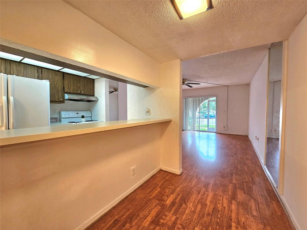 Photo of 10762 La Placida Dr #7-106, Coral Springs, FL 33065 (MLS # F10503312)