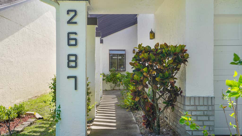 Photo of 2687 BLUE SAGE Avenue, Coconut Creek, FL 33063 (MLS # B26056217)