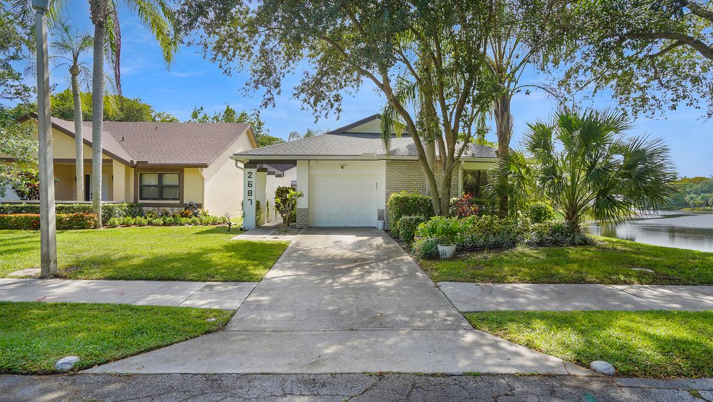 Photo of 2687 BLUE SAGE Avenue, Coconut Creek, FL 33063 (MLS # B26056217)