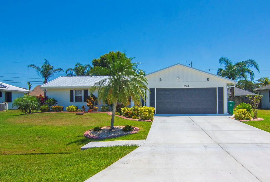 Photo of 2858 SE Rawlings Road, Port Saint Lucie, FL 34952 (MLS # R11118801)