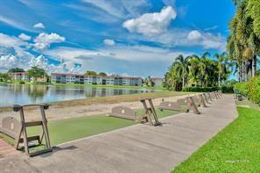 Photo of 9511 N Hollybrook Lake Dr #207, Pembroke Pines, FL 33025 (MLS # F10540941)