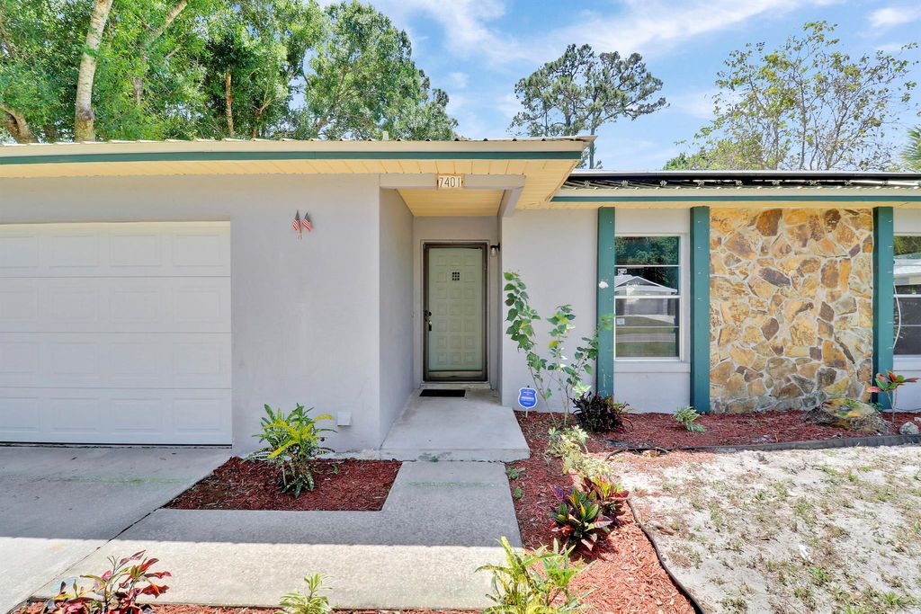 Photo of 7401 Winter Garden Parkway, Fort Pierce, FL 34951 (MLS # R11079529)