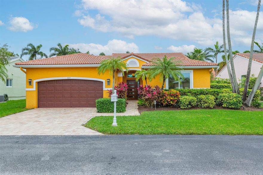 THIS CUSTOM DESIGNED HOME IS LOCATED IN A SMALL QUIET GATED COMMUNITY OF 48 HOMES.  YOU ENTER THE HOME THROUGH A CUSTOM MOHOGONY IMPACT DOOR INTO A SMALL FOYER LEADING INTO THE OPEN LIVING, DINING AND KITCHEN AREAS.  LIVING ROOM HAS A VAULTED CEILING, BRAZILIAN WOOD FLOORING OVERLOOKING THE BACK YARD.  THE STATE OF THE ART KITCHEN INCLUDES CUSTOM CABINETRY, GRANITE WATERFALL COUNTERS, STAINLESS STEEL APPLIANCES AND MARBLE FLOORING, BATHS ARE COMPLETELY UPGRADED WITH CUSTOM CLOSET DOORS.  HOMES HAS A 2 CAR GARAGE, BARREL TILE ROOF AND IMPACT WINDOWS AND DOORS.  COMMUNITY OFFERS A HEATED POOL AND TENNIS COURT.  LOWEST PRICED SINGLE FAMILY HOME AVAILABLE IN A TRUE GATED COMMUNITY. SIMILAR SIZE NEW CONSTRUCTION HOMES WITHIN A MILE HAVE SOLD FOR MORE THAN A MILLION DOLLARS.