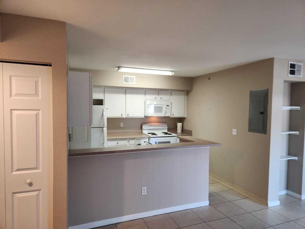 Photo of 201 SW Palm Drive #101, Port Saint Lucie, FL 34986 (MLS # R11111830)