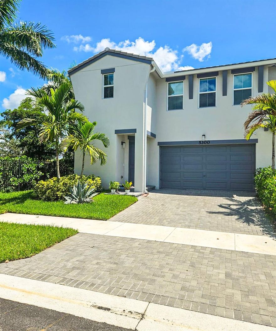 Spacious and bright 3-bedroom, 2.5-bath corner townhome ready for immediate occupancy! The primary suite is conveniently located on the first floor, with two additional bedrooms and a versatile loft upstairs. The modern kitchen features stainless steel appliances, including a refrigerator, microwave, dishwasher, and disposal. A private 2-car garage, full 2-car driveway, and guest parking directly across from the unit make parking effortless. Step out to your private patio and small backyard —a great spot to relax or enjoy some outdoor time. Located in a beautiful resort-style Westlake offering a vibrant lifestyle without the high cost of entertainment. Come see why this home is the perfect blend of comfort, convenience, & community living! Bright, open layout offers plenty of natural light