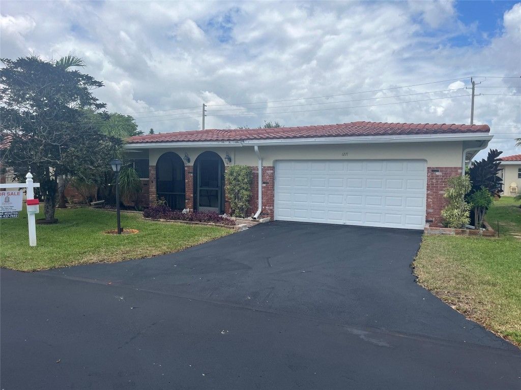 Photo of 1271 NW 44th Street, Deerfield Beach, FL 33064 (MLS # F10492240)