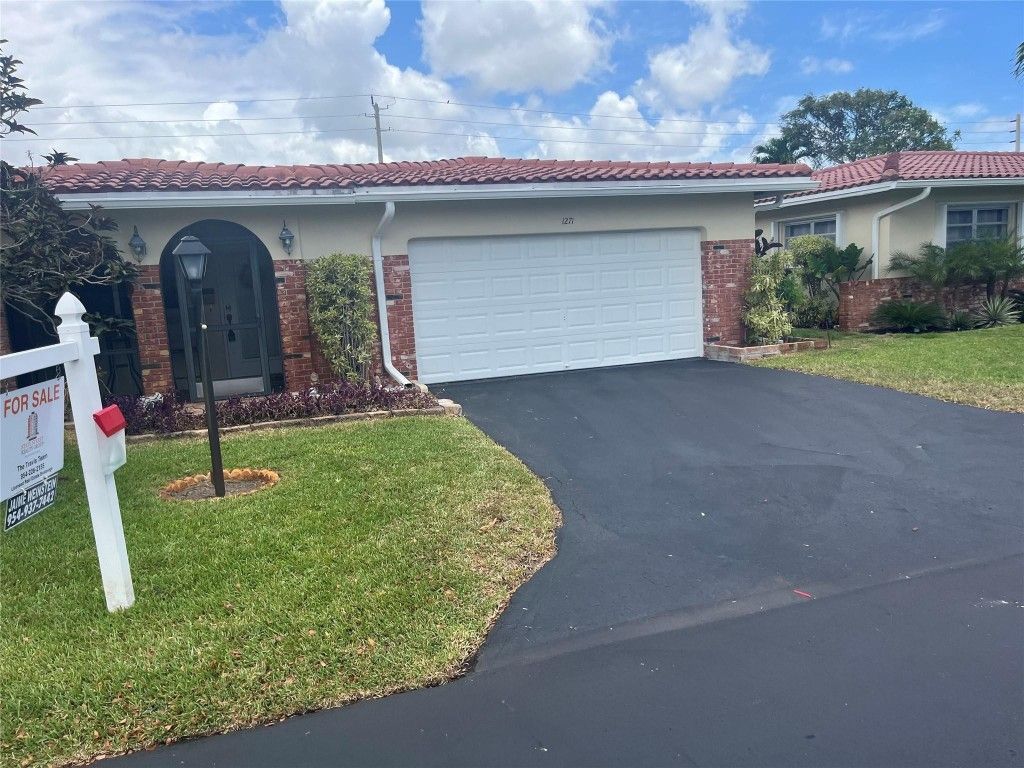 Photo of 1271 NW 44th Street, Deerfield Beach, FL 33064 (MLS # F10492240)