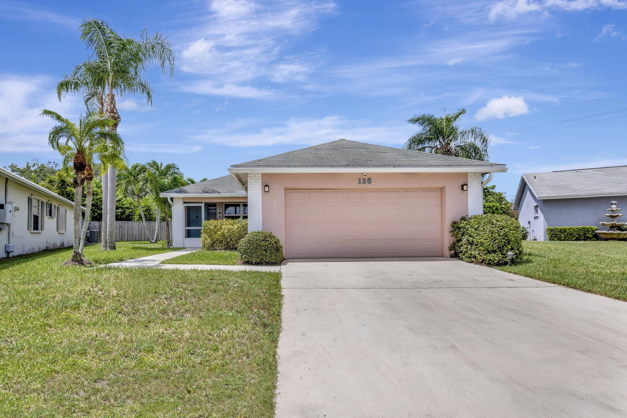 Welcome to this beautifully maintained 3/2 home in the heart of Jupiter, offering comfort, convenience, and peace of mind. Featuring impact windows, a newer AC system, and a newer hot water heater, this property is truly move-in ready.Inside, enjoy a bright and open layout with spacious living areas perfect for both everyday living and entertaining. The home sits on an oversized lot with plenty of room for a pool, creating endless possibilities for your outdoor retreat. Ideally located just 15 minutes from Jupiter's pristine beaches and top-rated restaurants, and only 30 minutes to the excitement of downtown West Palm Beach, this home offers the best of South Florida living. Families will also appreciate being zoned for Jupiter's highly sought-after A-rated schools, adding to this