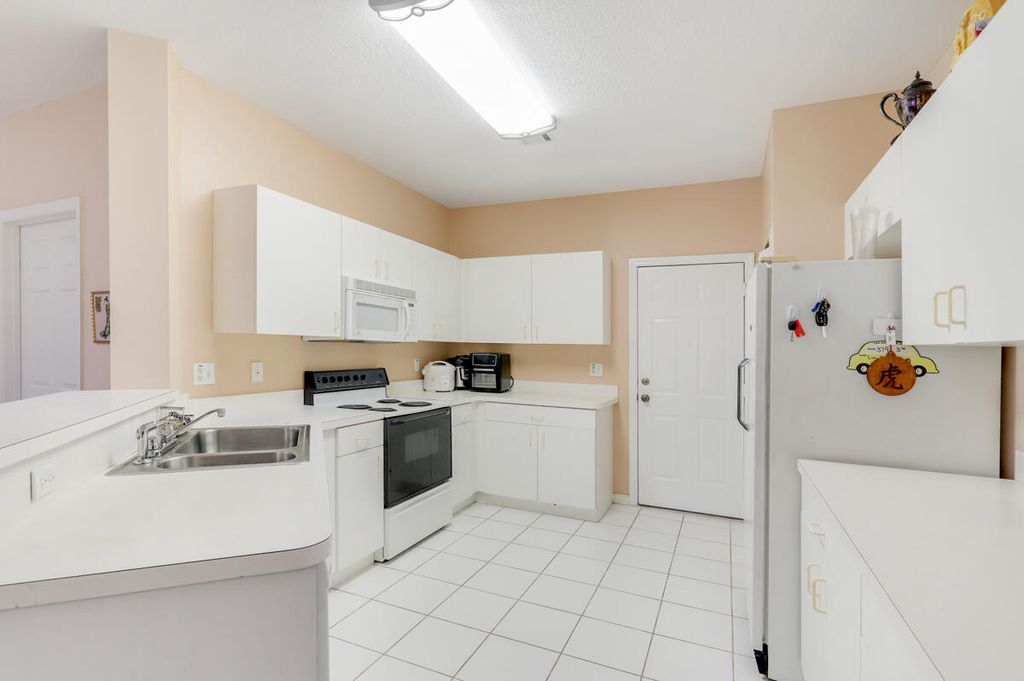 Photo of 9151 Villa Palma Lane, Palm Beach Gardens, FL 33418 (MLS # R10974460)