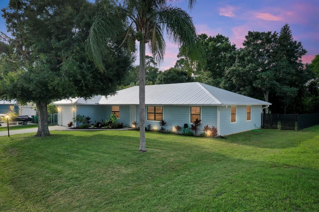 Photo of 1555 SW Jacqueline Avenue, Port Saint Lucie, FL 34953 (MLS # R10729812)