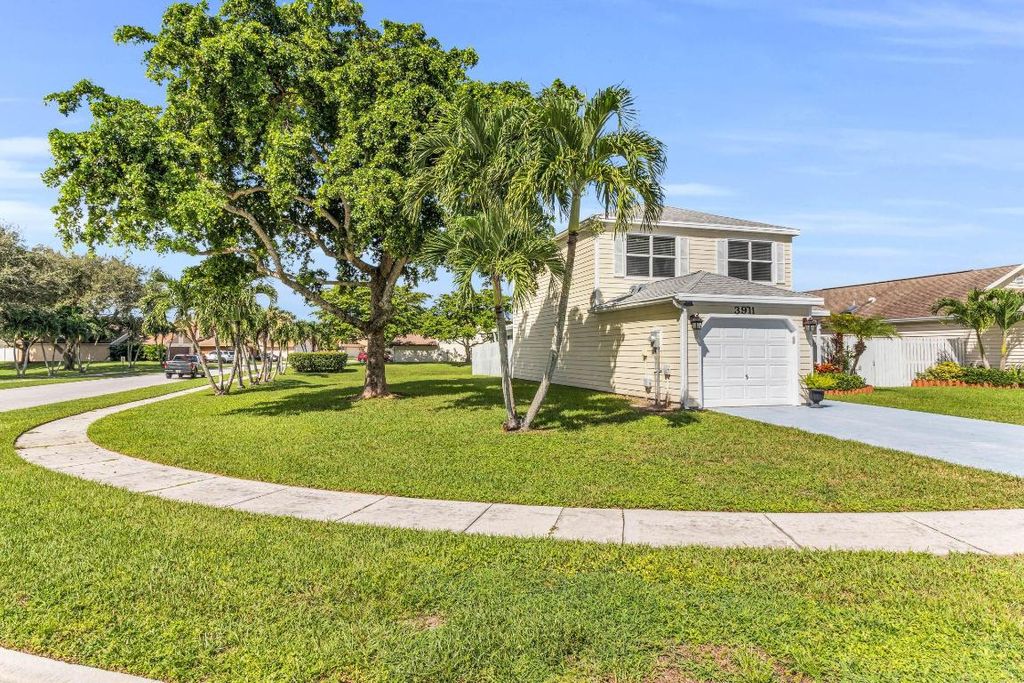 Photo of 3911 Circle Lake Dr, West Palm Beach, FL 33417 (MLS # R11143828)