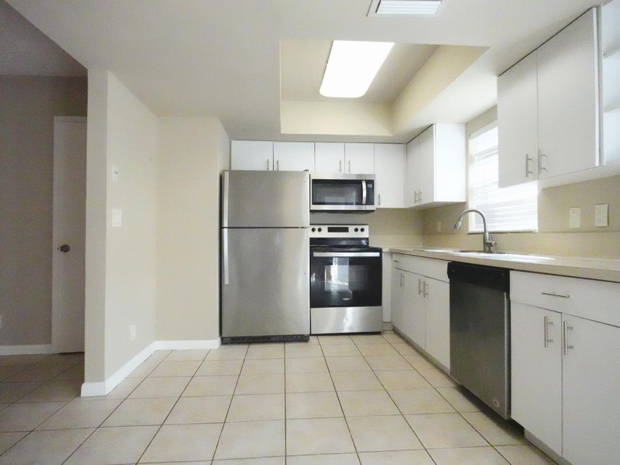 Stunning 2-bedroom townhome featuring an open kitchen and abundant natural light. Benefit from a private patio complete with a hand wash sink area, making it an ideal setting for any gatherings. The interior layout is both bright and spacious with easy access for washer and dryer hookup & storage area. With no rental restrictions, this home is perfect for investors, professionals, or anyone looking for a place to call home. It includes 2 designated parking spaces. Able to lease 1st year. The HOA takes care of the roof. Home is close to schools, Publix, shopping center & entertainments. EASY SHOWING.