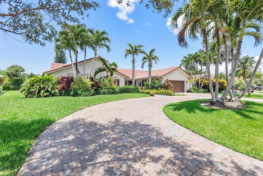This HOME is a MUST SEE!!! This oversized Maplewood 4 bedroom, 2.5 bathroom home is Located on a Large Cul-De-Sac, Waterfront and has a Pool. Amazing Additional Extra features include, Separate Enclosed Office off the Master Bedroom, Eat in Kitchen, Formal Dining, Two separate Ovens, Tons of Kitchen Cabinet Storage, Large Kitchen Island, Stainless Steel Appliances, Upgraded Kitchen and Bathrooms, Hurricane Windows and Doors, Double-sided Fireplace, Separate Laundry Room, Two AC Units, Newer Flooring, UV Lights in ACs, Newer Water Heater, Freshly Painted, Walk-in Closets, Lots of Extra Storage Closets, Large Hallways, Pavers, Large Circular Driveway and so much more....Hurry, this one won't last.
