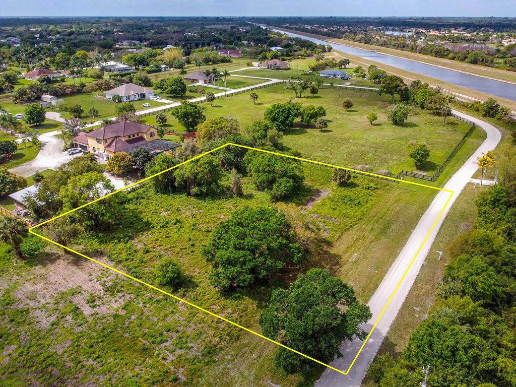 Photo of 7594 169th Place N, Palm Beach Gardens, FL 33418 (MLS # R10783050)