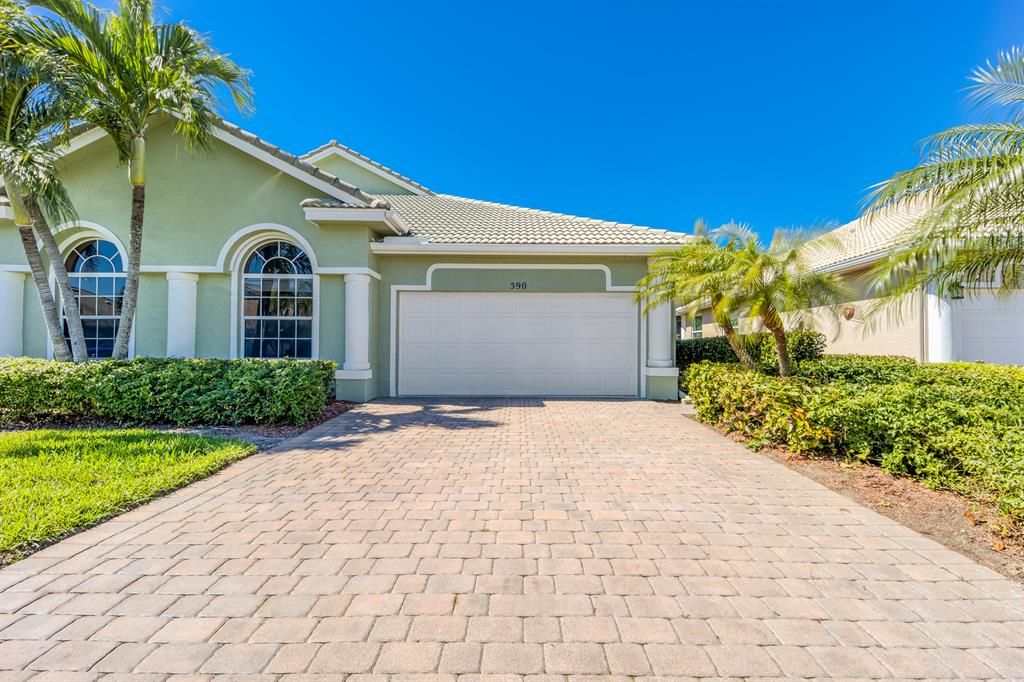 Photo of 590 NW Red Pine Way, Jensen Beach, FL 34957 (MLS # R10695984)