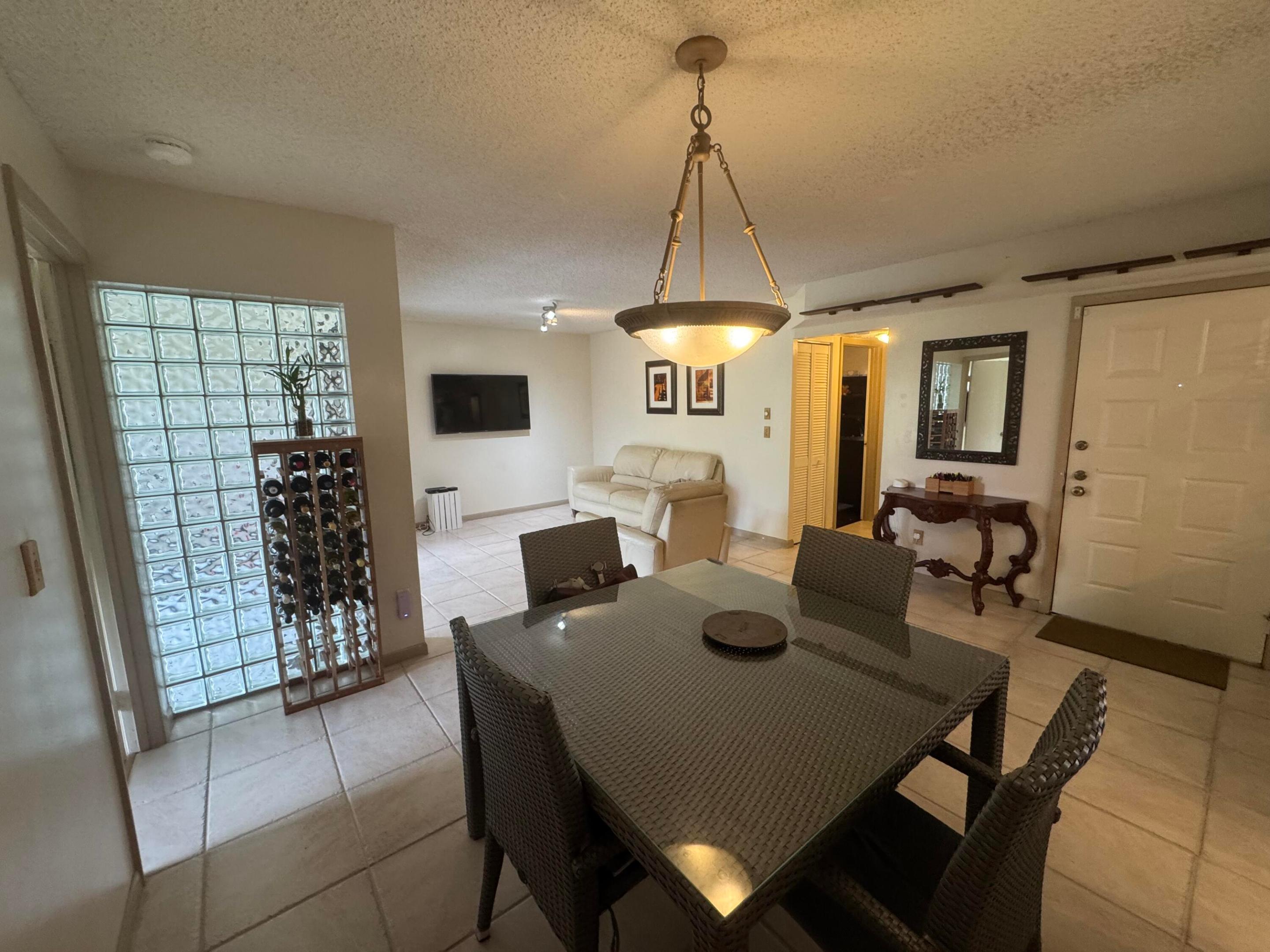 QUATRAINE AT JACARANDA GARDENS - Residential