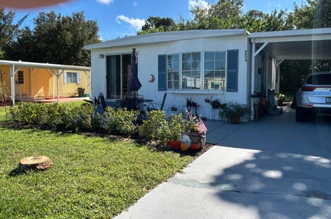 Photo of 254 W Caribbean, Port Saint Lucie, FL 34952 (MLS # B26061008)