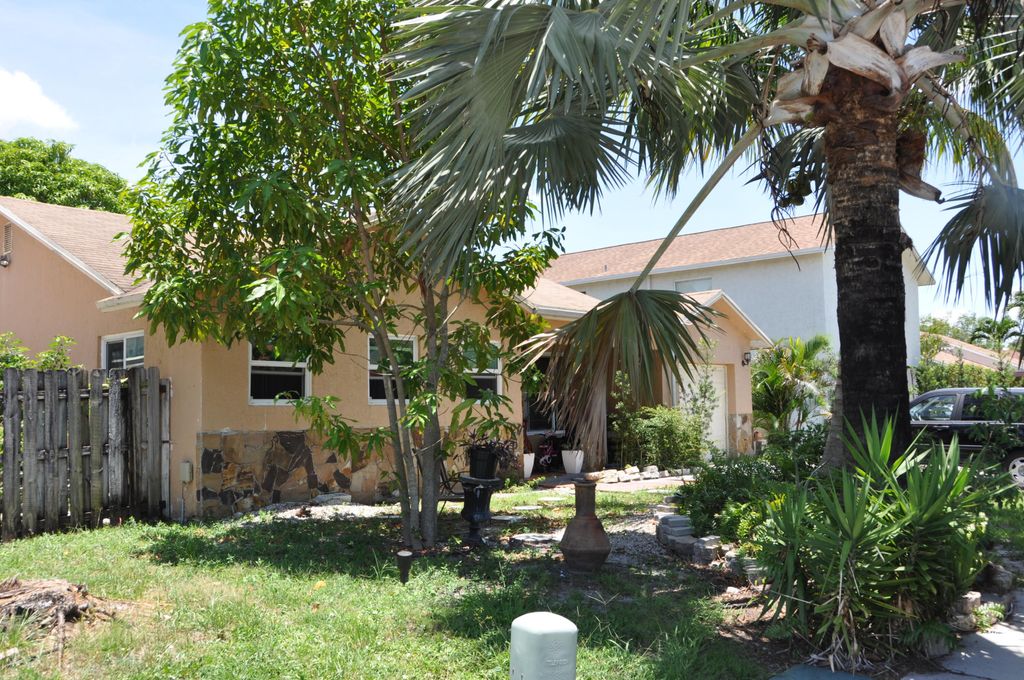 Photo of 1906 SW 87th Avenue, North Lauderdale, FL 33068 (MLS # B26047474)