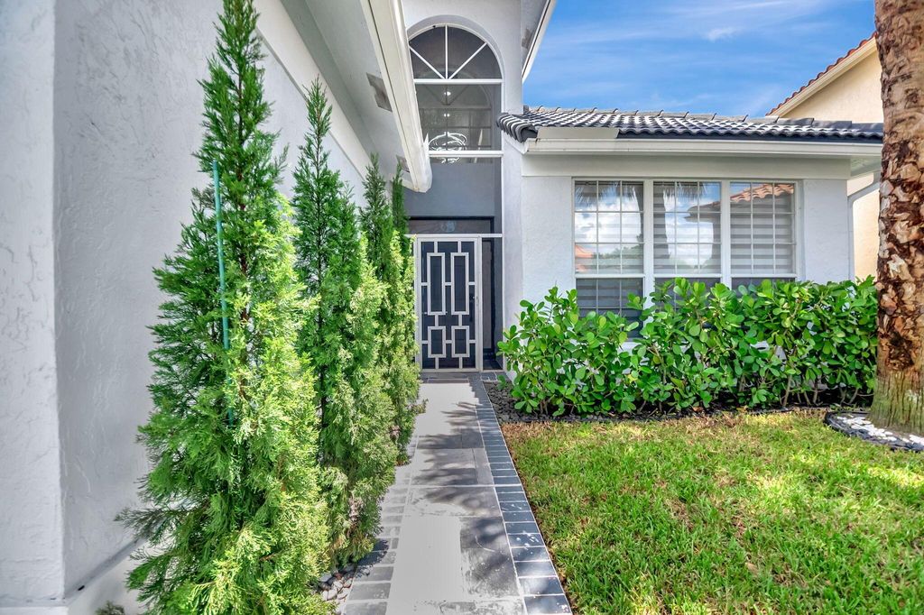 Photo of 10872 Tamoron Lane, Boca Raton, FL 33498 (MLS # R11116018)