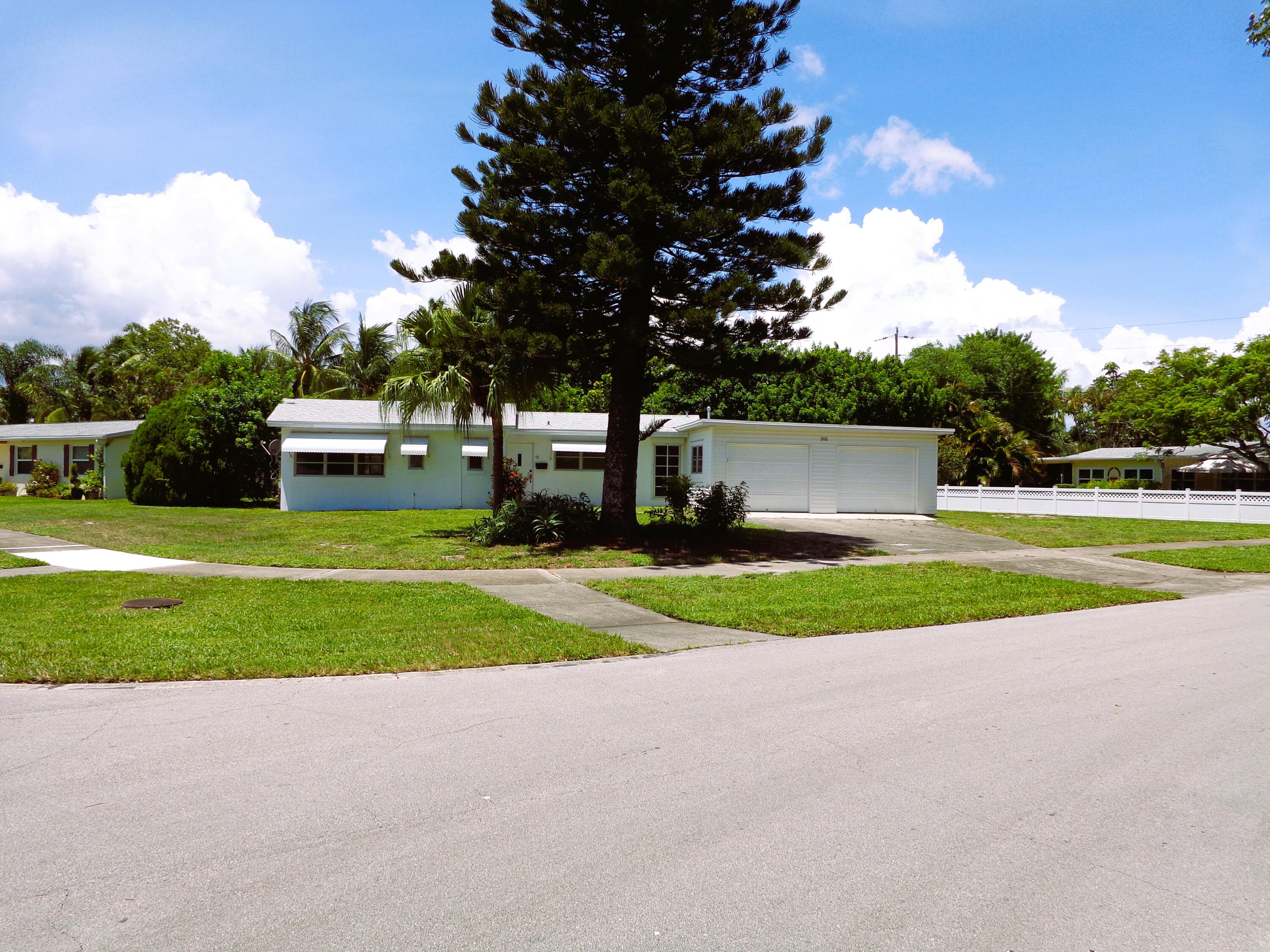 Great opportunity to embrace the Florida lifestyle in this Charming Village of North Palm Beach. Great for investors or families determined to design their own level of remodeling and upgrades. House needs remodeling, some demo partially done including the Kitchen and, en-suite bathroom. Corner lot app 1/4 acre. Huge backyard with ample room to add a pool and barbecue area. Roof is less than 2 years old, outside ac condenser 1year old. Timeless terrazzo flooring throughout. 2 Car garage has an added area large enough to add an extra room, or extend the living room area. Conveniently located near shopping, restaurants, banks, Gardens Mall, and many other attractions. Also just minutes away from the prestigious Florida beaches. Don't miss out on this rare opportunity