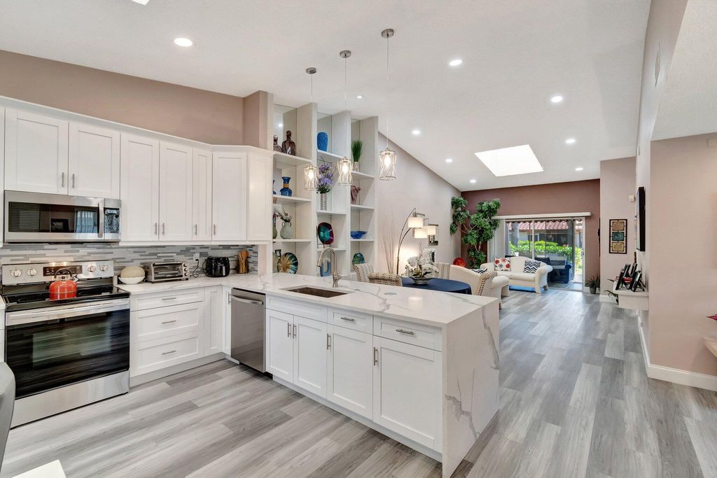 Photo of 6100 Waldwick Circle, Delray Beach, FL 33484 (MLS # B26011414)