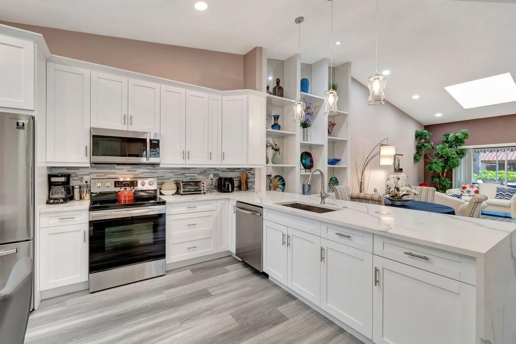 Photo of 6100 Waldwick Circle, Delray Beach, FL 33484 (MLS # B26011414)