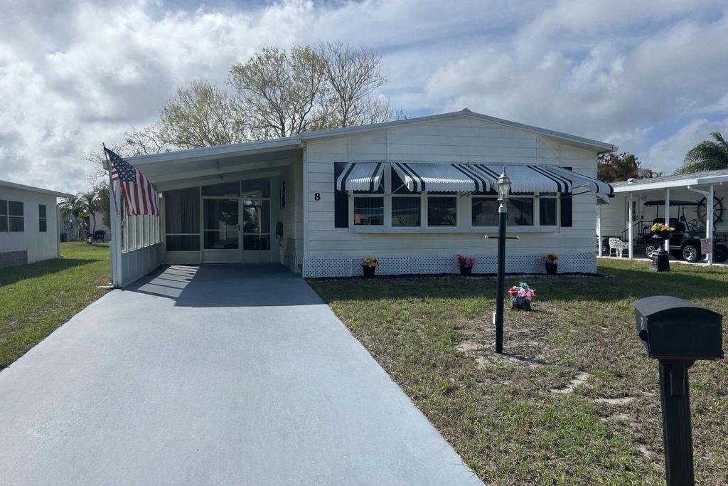 Photo of 8 Grande Camino Place, Fort Pierce, FL 34951 (MLS # B26001950)