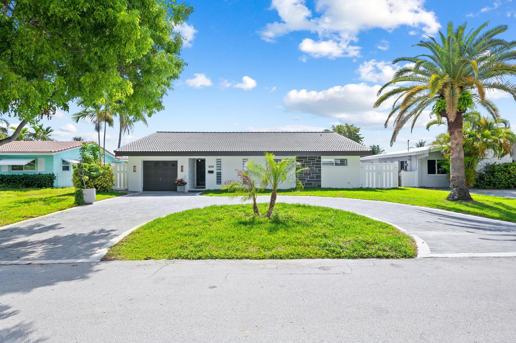 Fully renovated 3-bedroom, 2-bath home located on a quiet cul-de-sac with 70 feet of east-facing waterfront. Enjoy an open-concept living and kitchen area filled with natural light, perfect for relaxing or entertaining. Enjoy serene water and pool views, a one-car garage, and a convenient circular driveway. Ideal for boaters - short boat ride to the intracoastal and Lighthouse Point inlet. Located just minutes from the beach, restaurants, bars, publix, highways, top golf, and so much more! A rare rental opportunity in a highly desirable area!