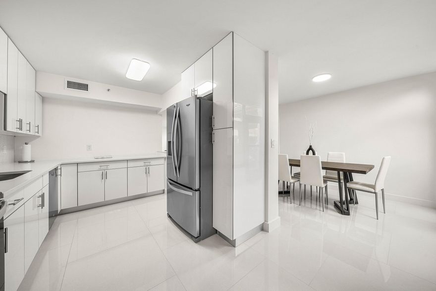 Completely reimagined and ideally positioned on the first floor, this stunning residence in Promenade at Boca Pointe offers three bedrooms, two bathrooms, and a bright, open layout designed for effortless living. Natural light pours through the space, highlighting clean, modern finishes and a seamless flow from the sleek, updated kitchen into expansive living and dining areas. Sliding doors lead to a private patio overlooking tranquil golf course views, creating the perfect setting to unwind.  The spacious primary suite serves as a true retreat, featuring generous closet space and a beautifully designed spa-inspired bathroom. Residents of Promenade enjoy access to resort-style amenities, including a sparkling pool and clubhouse, with the option to join Boca Pointe Country Club  for an elevated lifestyle experience. All of this is just minutes from Boca Raton's premier dining, shopping, and pristine beaches.