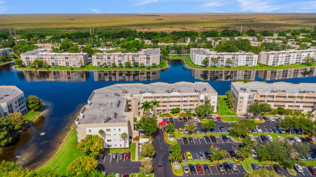 Photo of 7759 GRANVILLE Drive #306, Tamarac, FL 33321 (MLS # B26068673)