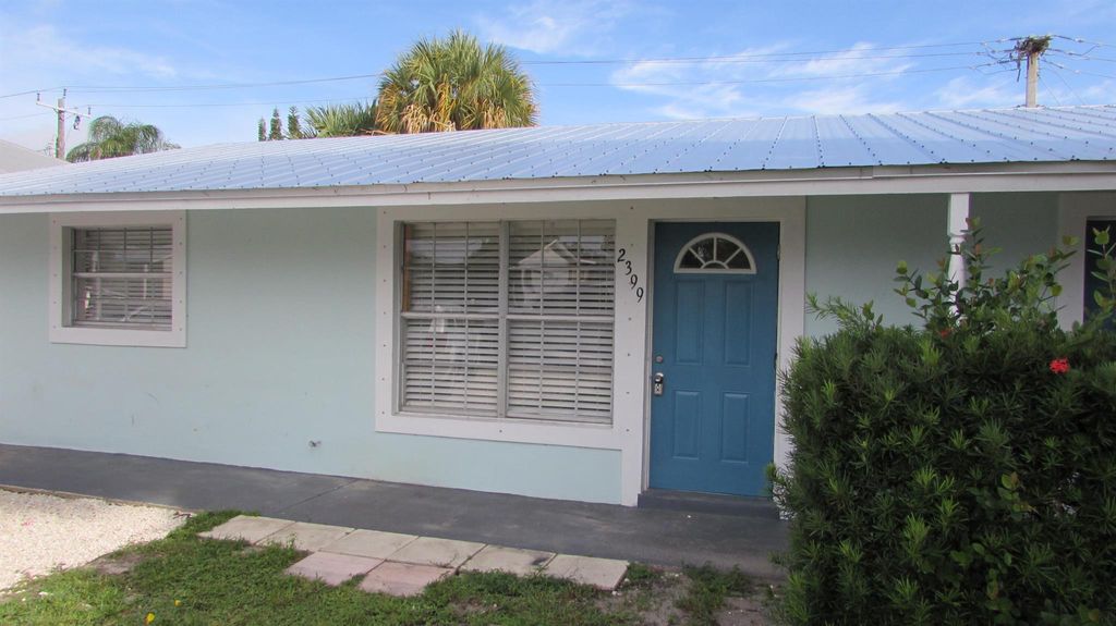 Photo of 2399 NE Rustic Way, Jensen Beach, FL 34957 (MLS # R10930763)