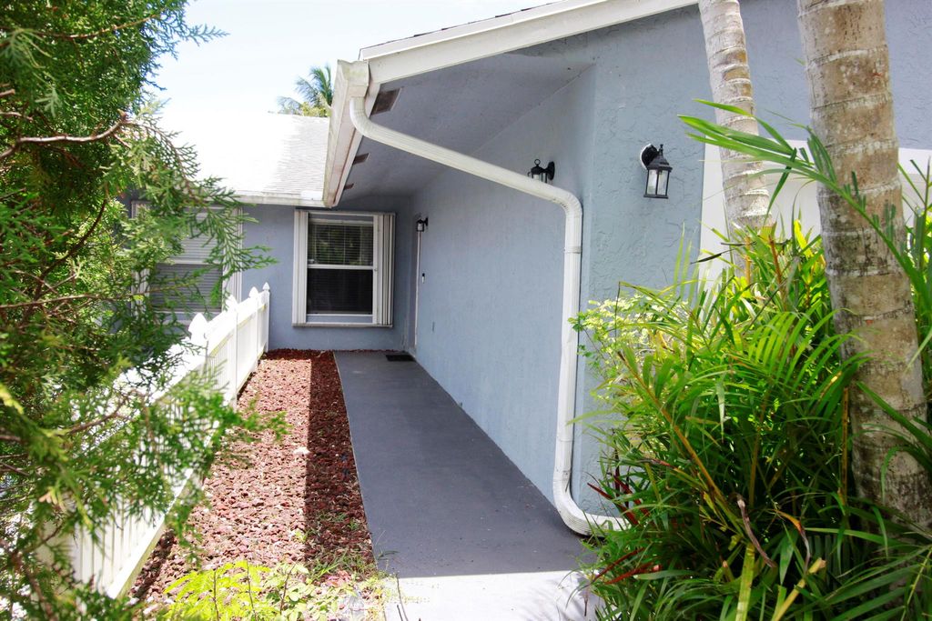 Photo of 134 Sparrow Drive #B, Royal Palm Beach, FL 33411 (MLS # R11109992)