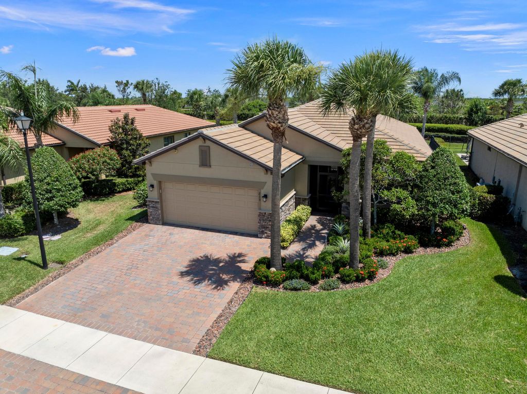 Photo of 215 SE Courances Drive, Port Saint Lucie, FL 34984 (MLS # R10996761)