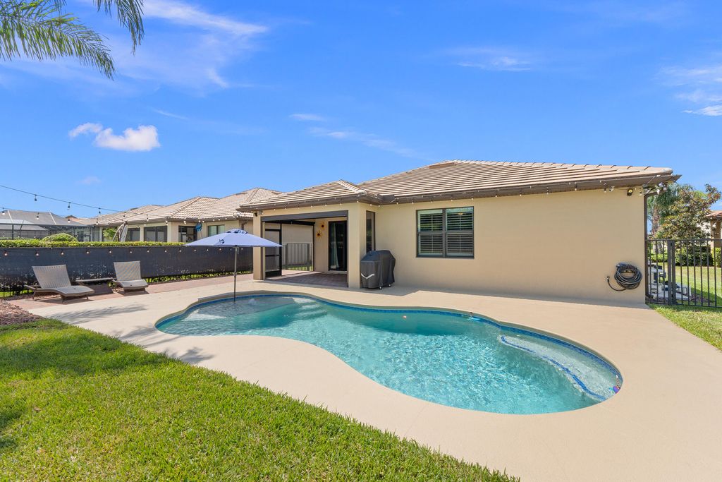 Photo of 215 SE Courances Drive, Port Saint Lucie, FL 34984 (MLS # R10996761)