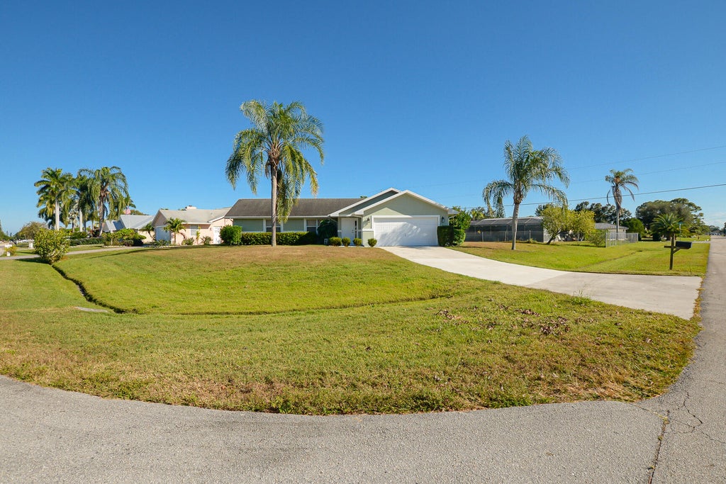 Photo of 1775 SW Brisbane Street, Port Saint Lucie, FL 34984 (MLS # R11142457)