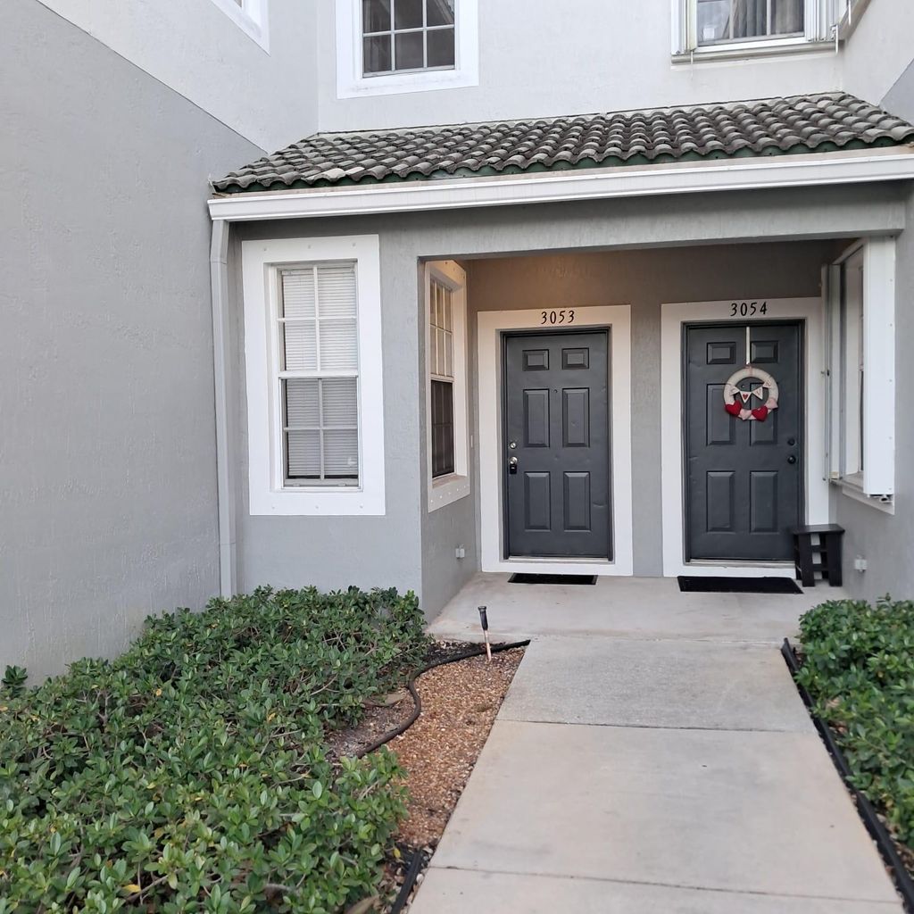 Photo of 3053 Grandiflora Drive #5104, Greenacres, FL 33467 (MLS # R11062039)