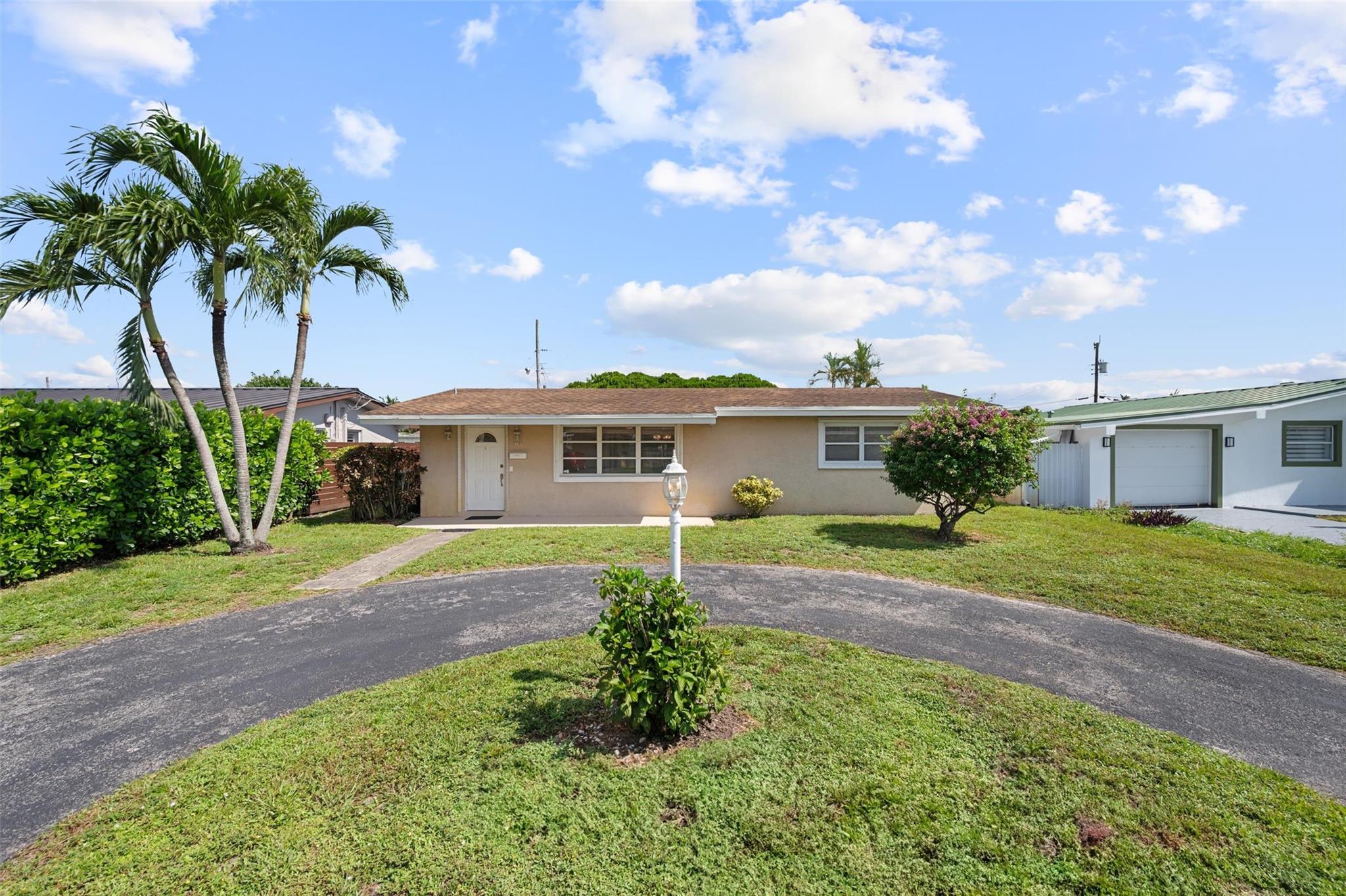 Discover comfort and convenience in this beautifully updated 2BR/1BA home perfect for families, professionals, or anyone seeking a quiet space close to it all. Features central A/C, washer & dryer under air, updated flooring and kitchen with new appliances, a renovated bathroom and modern finishes throughout. Enjoy a bright open living room with Florida room great for an office, playroom, or relaxation space. Screened back porch and large fenced backyard offers plenty of outdoor space for entertaining and gardening. Located close to shopping, schools, and restaurants. Move-in ready! Rent Spree screening required. Minimum 650 Credit Score. NO PETS Maximum 3 vehicles