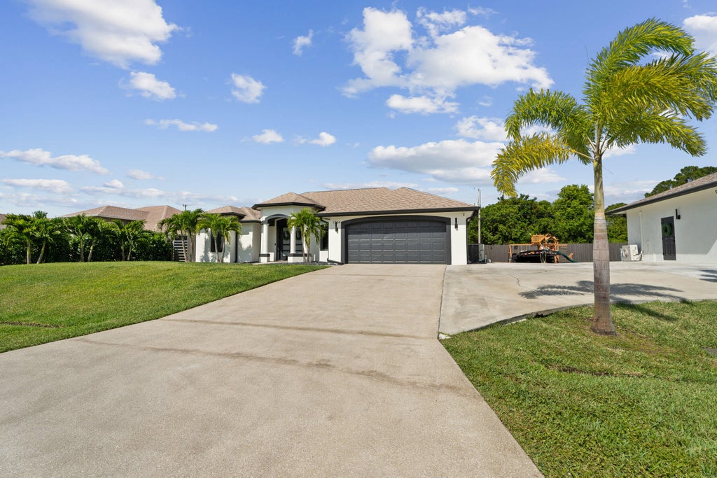 Photo of 1784 SW Erie Street, Port Saint Lucie, FL 34953 (MLS # R11081712)