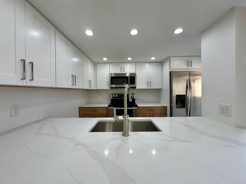 Photo of 9148 SW 23rd Street #A, Davie, FL 33324 (MLS # B26030002)