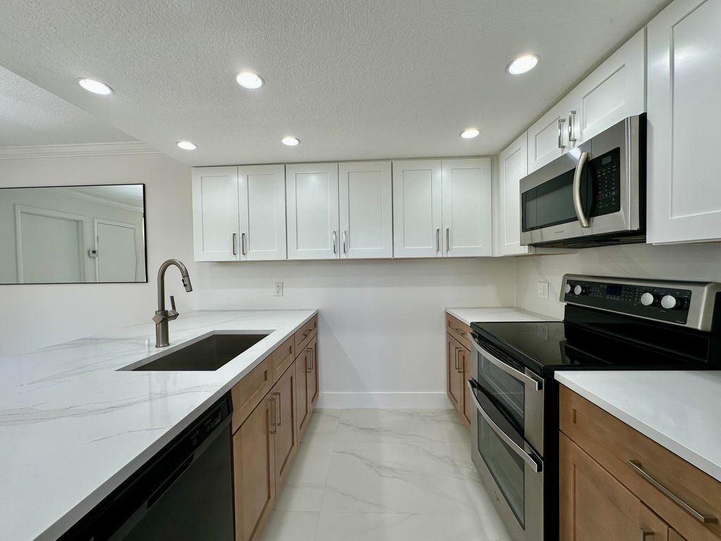 Photo of 9148 SW 23rd Street #A, Davie, FL 33324 (MLS # B26030002)