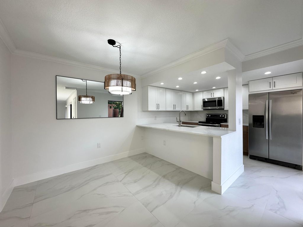 Photo of 9148 SW 23rd Street #A, Davie, FL 33324 (MLS # B26030002)