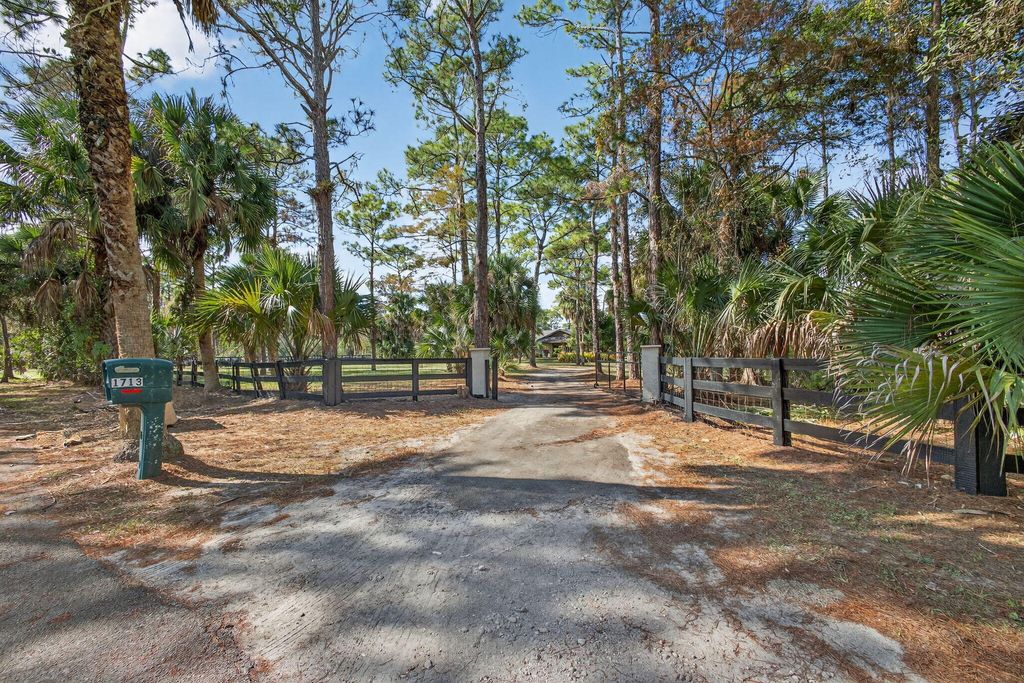 Photo of 1713 Arabian Drive, Loxahatchee, FL 33470 (MLS # R11143900)