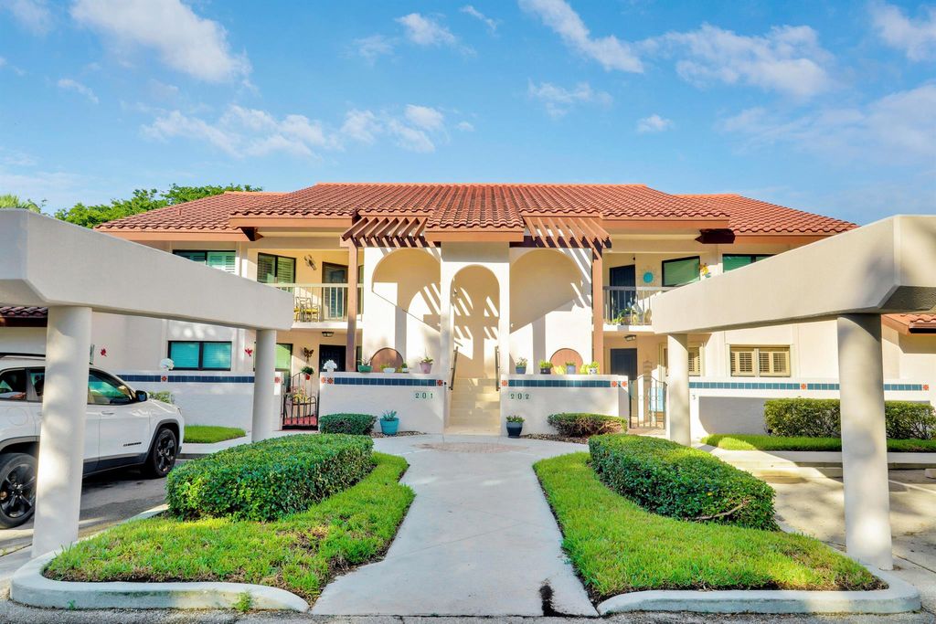 Photo of 6011 SE Martinique Drive #103, Stuart, FL 34997 (MLS # R11132642)