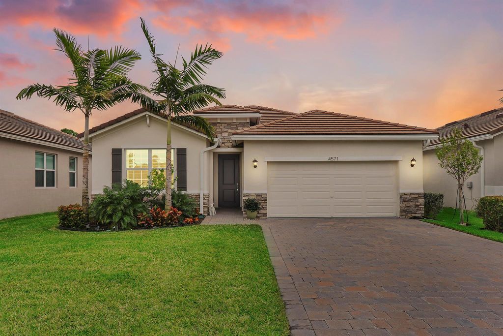 Photo of 4571 NW Exchange Avenue, Jensen Beach, FL 34957 (MLS # R10943326)