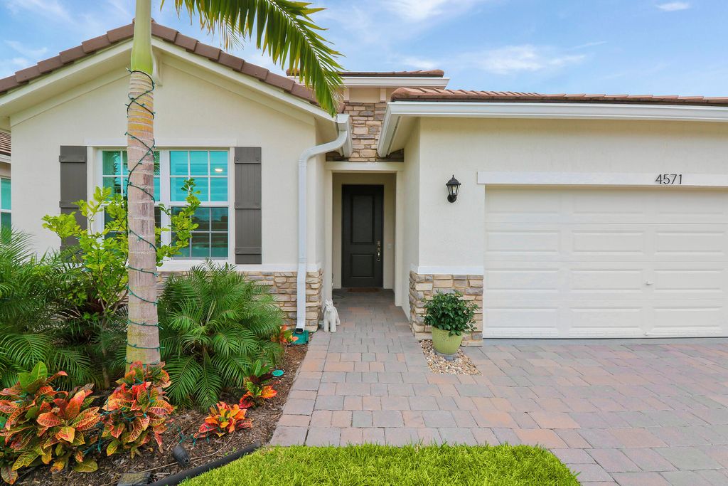 Photo of 4571 NW Exchange Avenue, Jensen Beach, FL 34957 (MLS # R10943326)