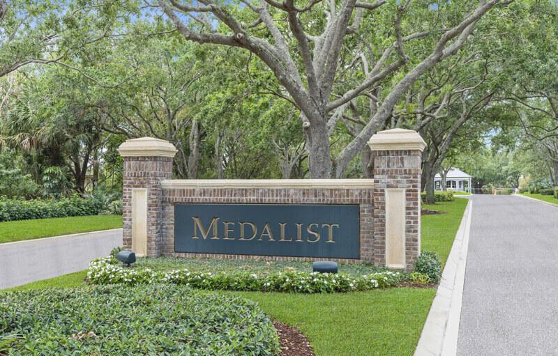 A beautiful vacant lot located on a cul-de-sac within the prestigious Medalist Village Golf Club in Hobe Sound. This exclusive community, set on 888 acres of pristine bushland, offers residents a tranquil and luxurious living experience. The lot is surrounded by lush landscaping, providing a serene and picturesque setting. Medalist Village offers top-tier amenities, including a clubhouse featuring casual dining and the renowned ''Aussie Pub.'' Residents also have access to a five-star resort-style spa, fully equipped fitness rooms with personal training available, and Har-Tru tennis courts. Golf enthusiasts can enjoy a unique 12-hole Par 3 Course, designed for players of all skill levels, making this community a perfect choice for those seeking a refined and active lifest