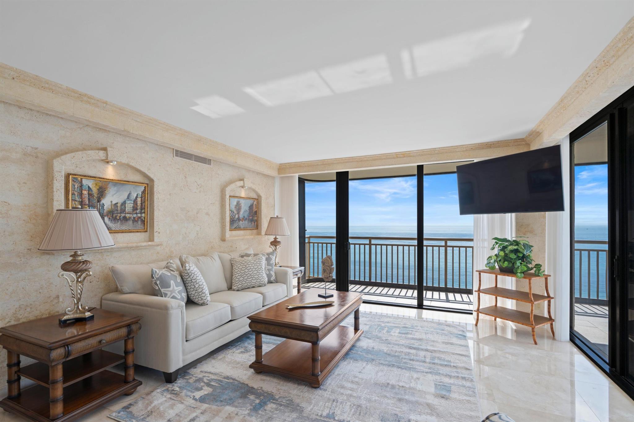 Welcome to the epitome of oceanfront luxury at Penthouse 2 in the coveted Oceantree Condominium, available for annual or extended lease. This exquisite turnkey penthouse offers an unparalleled living experience, boasting stellar oceanfront and intracoastal views perfect for taking in the calming energy. Every detail in this fully furnished apartment exudes warmth and elegance, featuring newly polished marble flooring and baseboards throughout. The impressive layout includes three bedrooms, three full bathrooms, and a convenient in-unit washer and dryer. Culinary enthusiasts will delight in the incredible kitchen, equipped with top-of-the-line appliances such as a Wolf stove, SubZero refrigerator, SubZero wine cooler, and dishwasher.