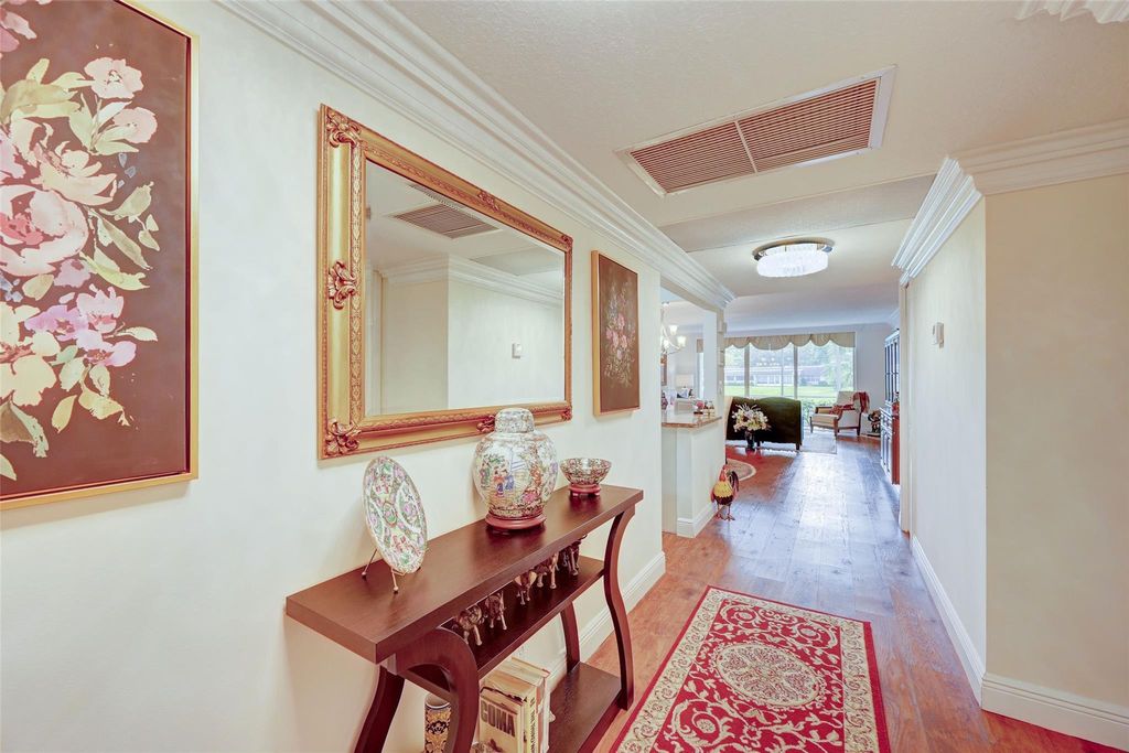Photo of 3621 Oaks Clubhouse Drive #101, Pompano Beach, FL 33069 (MLS # F10412214)
