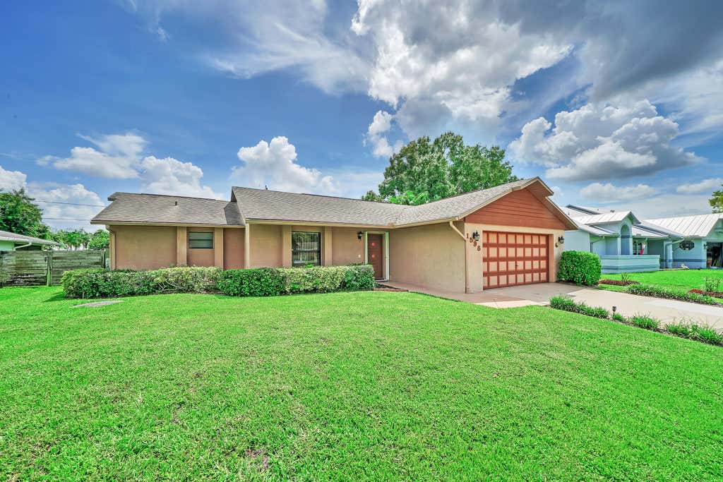 Photo of 1598 SE Holiday Road, Port Saint Lucie, FL 34952 (MLS # R11020123)