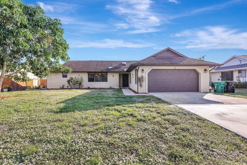 Photo of 138 SW Oakridge Drive, Port Saint Lucie, FL 34984 (MLS # R11046813)